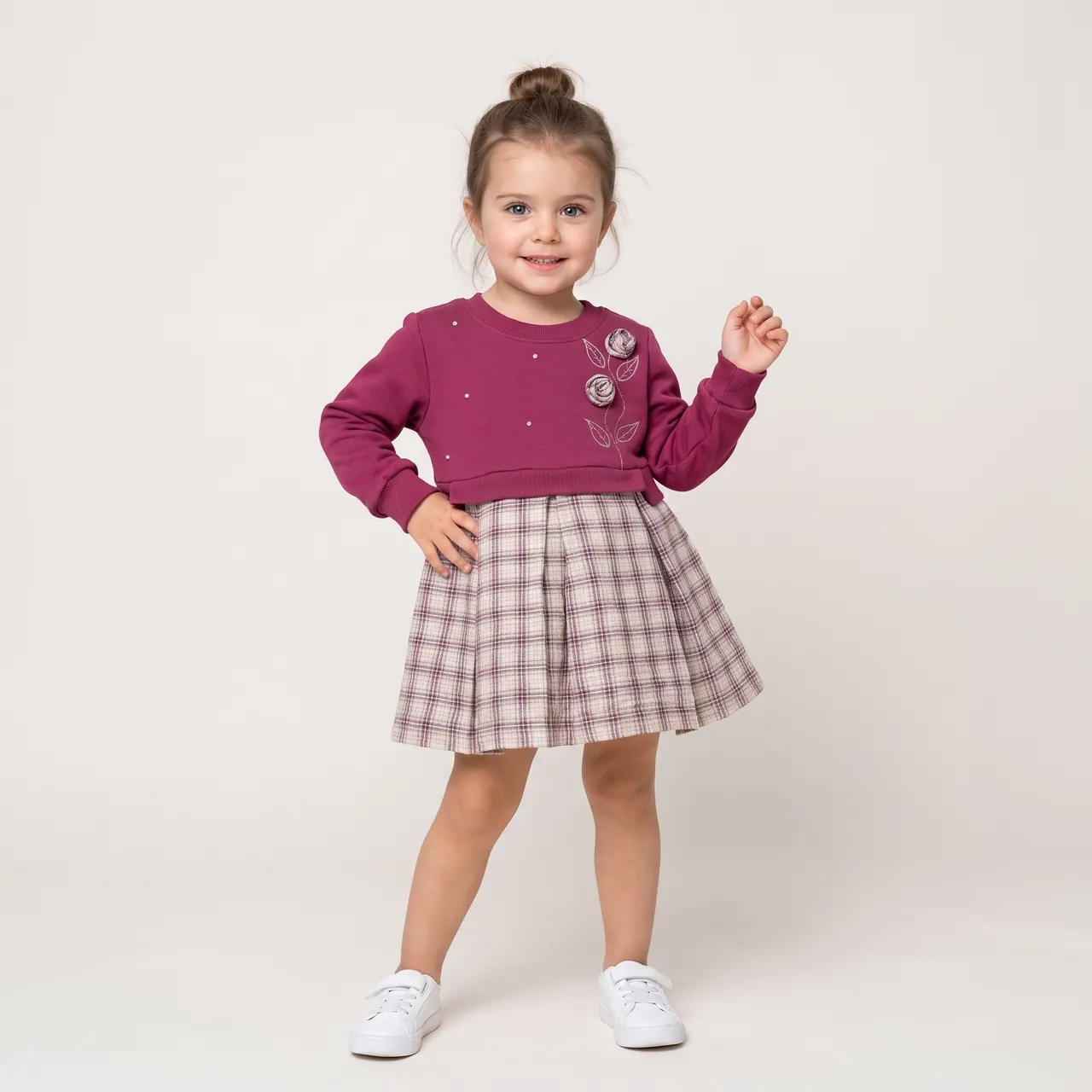 Bordo üst ve ekose etek giyen dijital kız çocuk modeli
