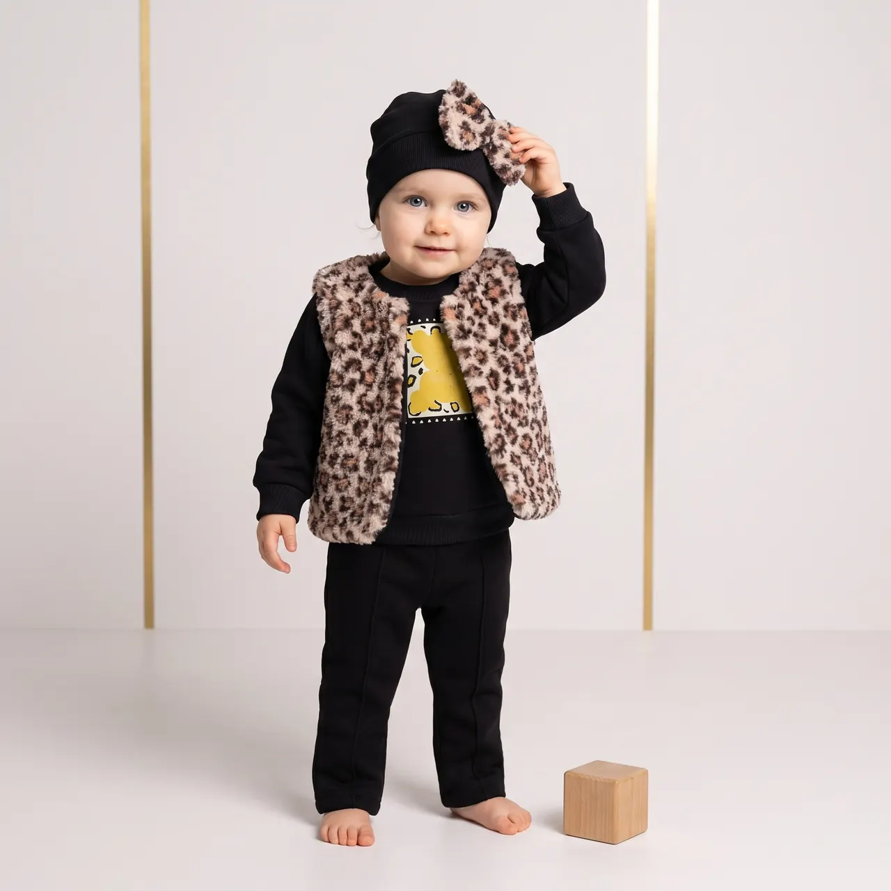 Leopar yelekli siyah takım giyen dijital bebek modeli